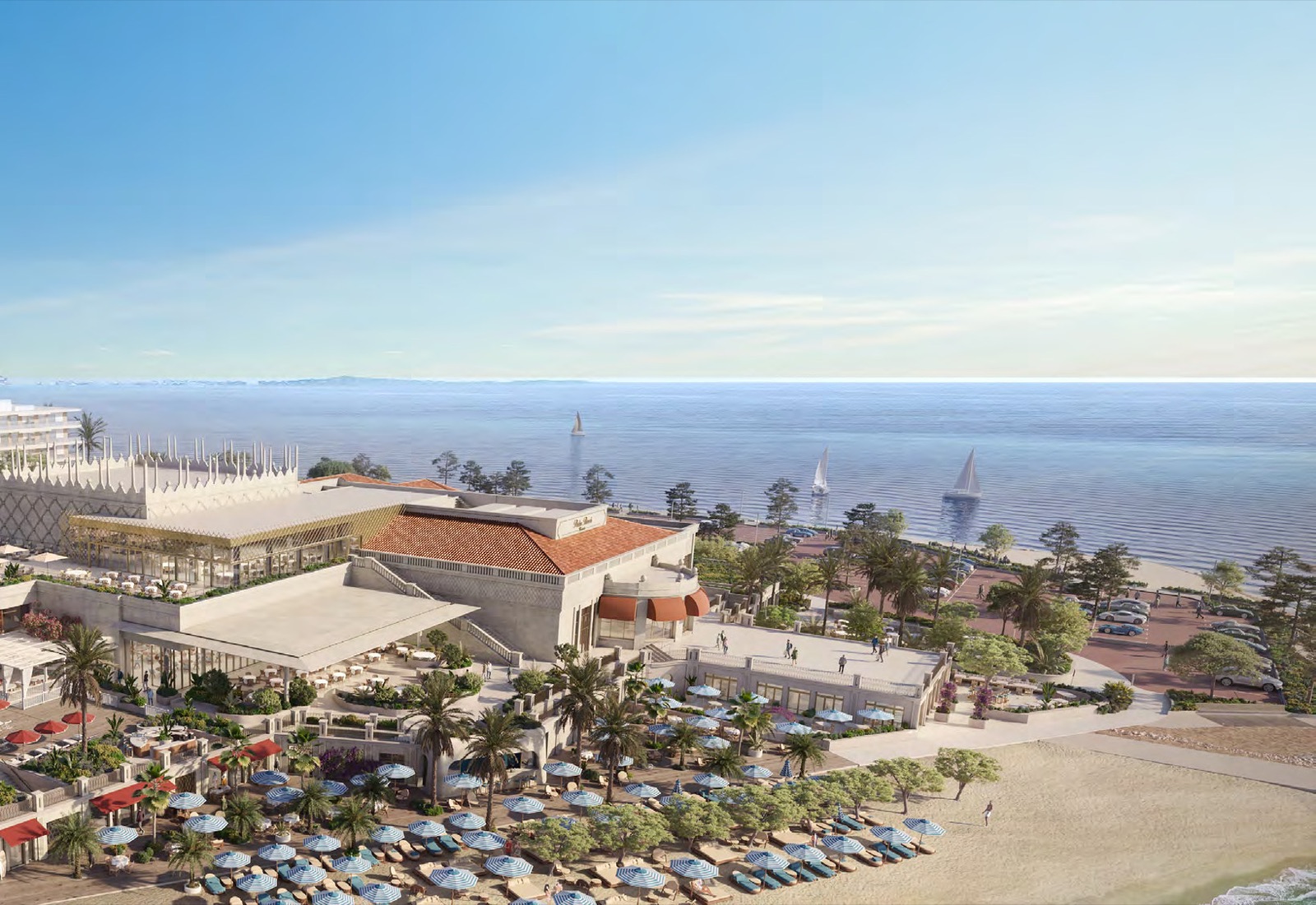 Vue aérienne du Palm Beach : la salle intérieure et la terrasse surplombant la plage et la baie de Cannes